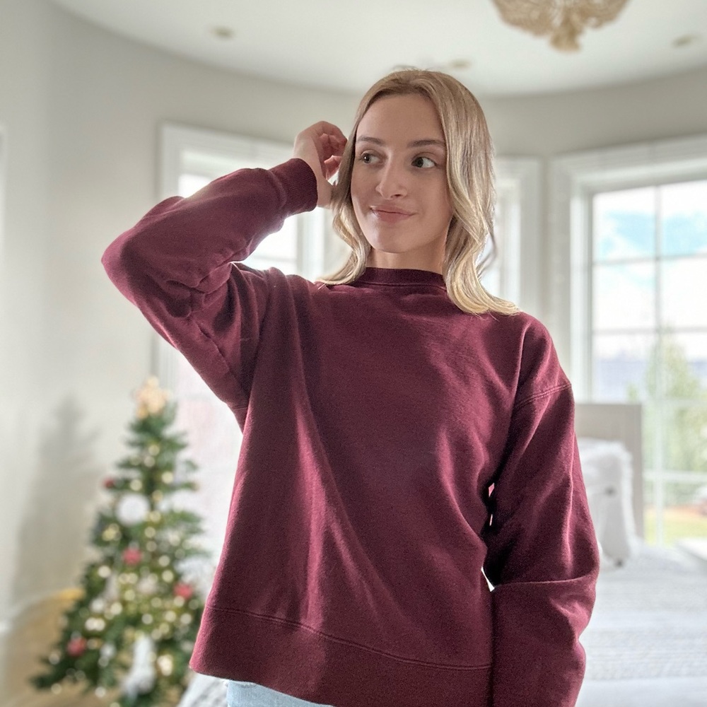 red sweatshirt from cotton on. is an extra small